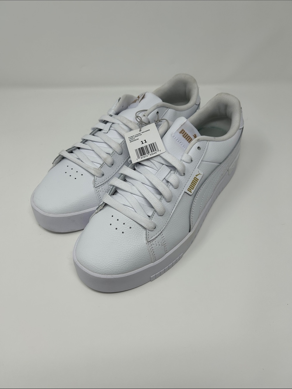Puma Court Sneaker White Low-Top Sneakers with Gold Accents. 1840720
